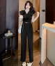 Jumpsuit dài cổ V phối bèo màu Đen